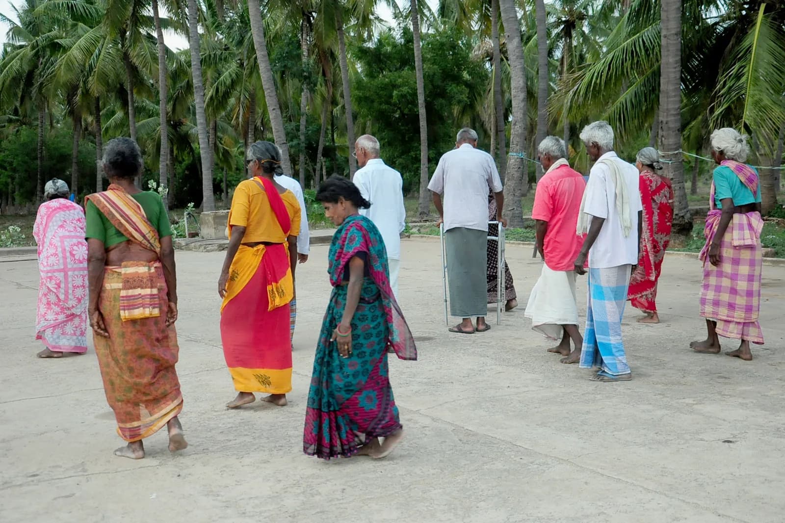 A group of community members standing outdoors